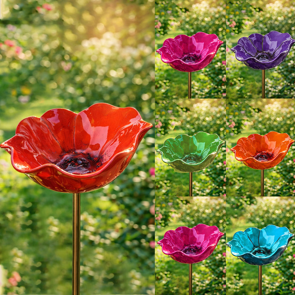 Collage of colorful glass bird baths on stakes with a garden background.